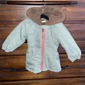 Kids coat in cargo green and Sherpa lining and hood